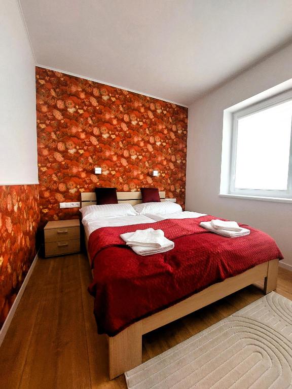 Postel nebo postele na pokoji v ubytování Three Diamonds Residence