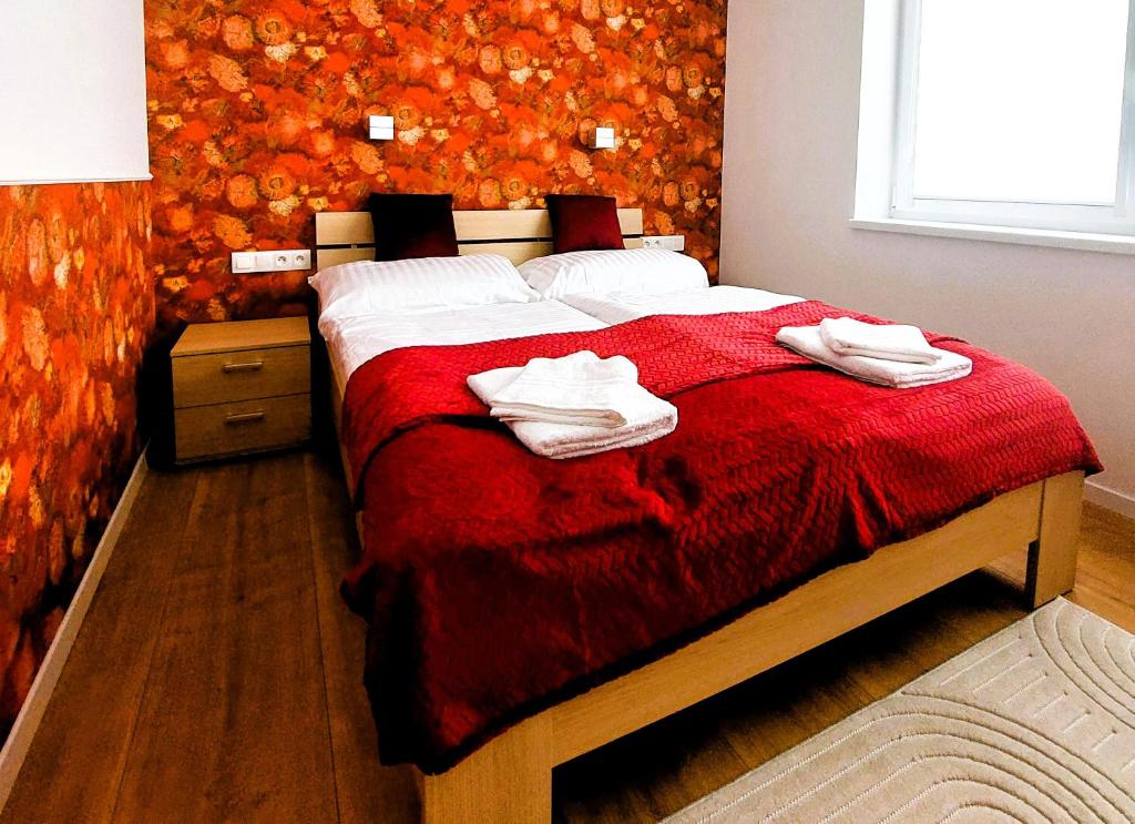 Postel nebo postele na pokoji v ubytování Three Diamonds Residence