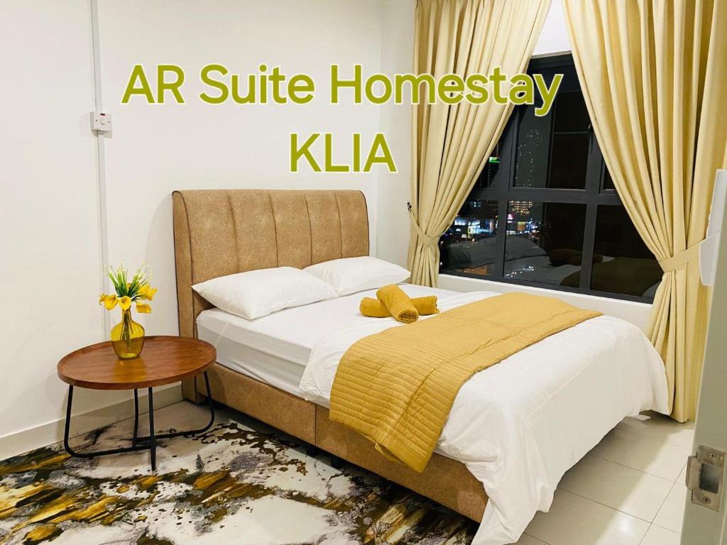 Katil atau katil-katil dalam bilik di AR Homestay near KLIA Airport 3BR Fully Aircond