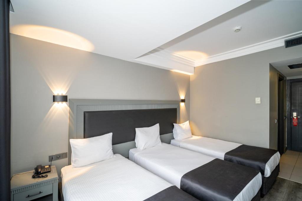 Grand S Hotel - Quarto Triplo Básico
