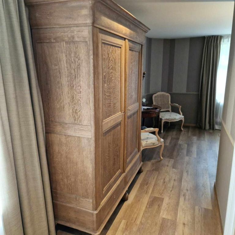 Posezení v ubytování Hôtel Le Cor de Chasse