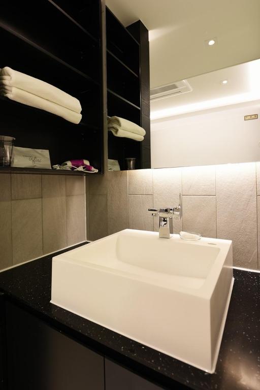 Koupelna v ubytování Hotel Infini