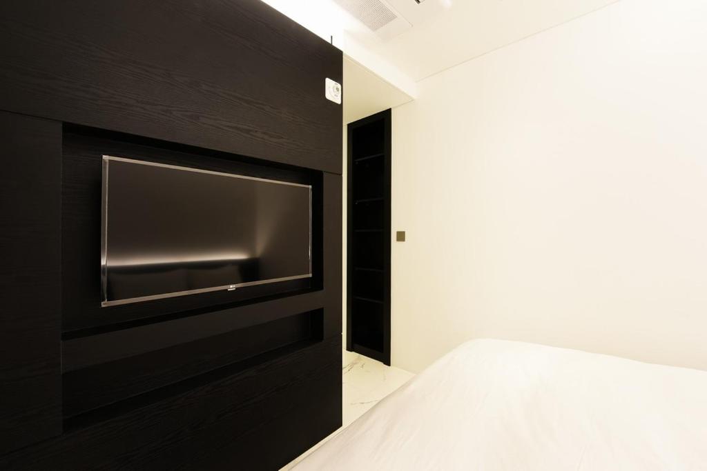 Postel nebo postele na pokoji v ubytování Hotel Infini