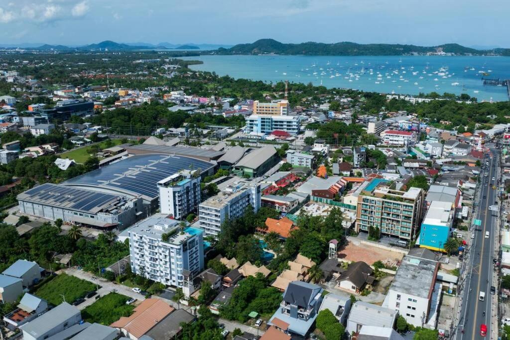 an aerial view of a city with a body of water at Contemporary 1BR Condo - NV-724 in Phuket Town