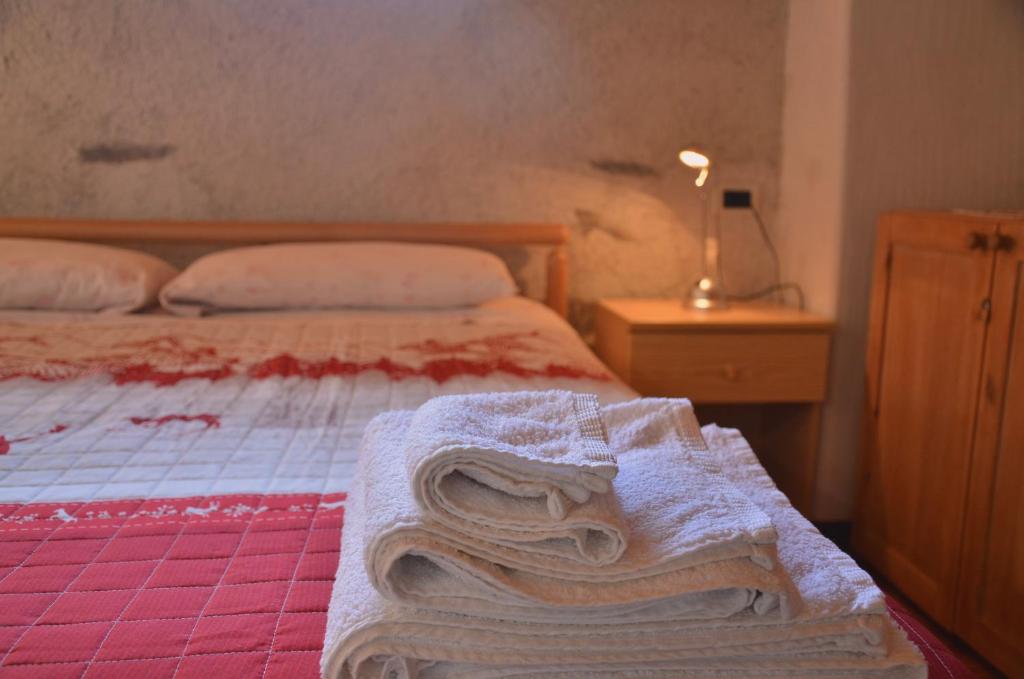 Postel nebo postele na pokoji v ubytování Chalet Maso Salam