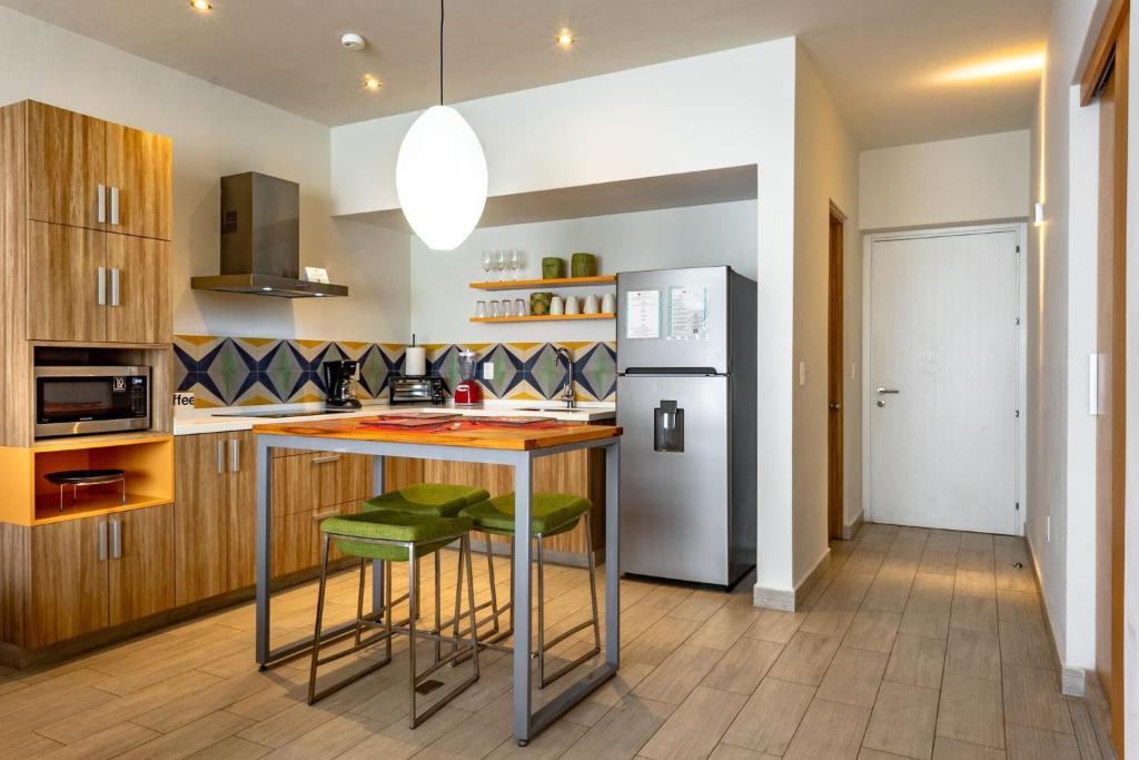 Kuchyň nebo kuchyňský kout v ubytování Opal Suites Apartments