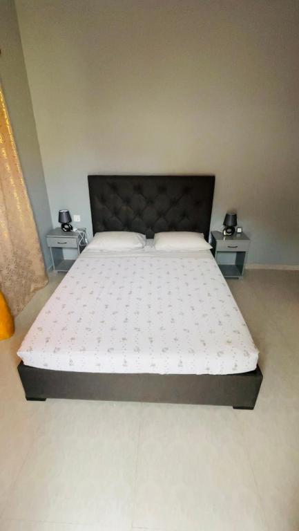 Postel nebo postele na pokoji v ubytování Hostel Rocha Marisol