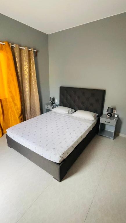 Postel nebo postele na pokoji v ubytování Hostel Rocha Marisol