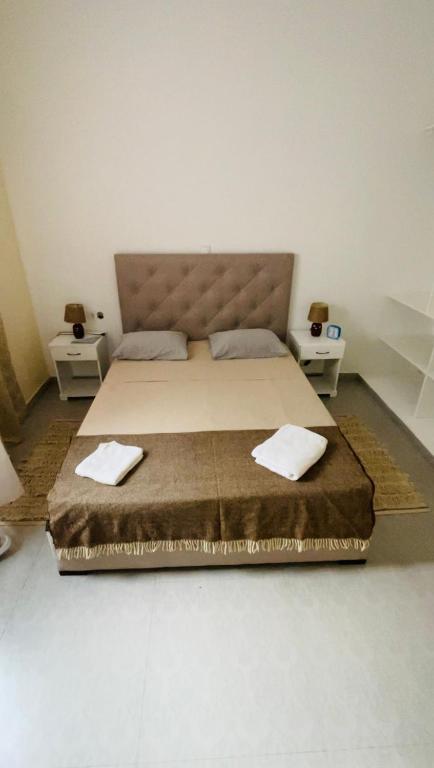 Postel nebo postele na pokoji v ubytování Hostel Rocha Marisol