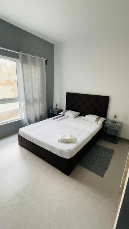 Postel nebo postele na pokoji v ubytování Hostel Rocha Marisol