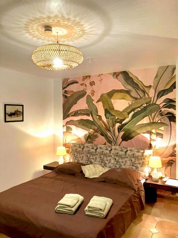Postel nebo postele na pokoji v ubytování Villa Les Nereides
