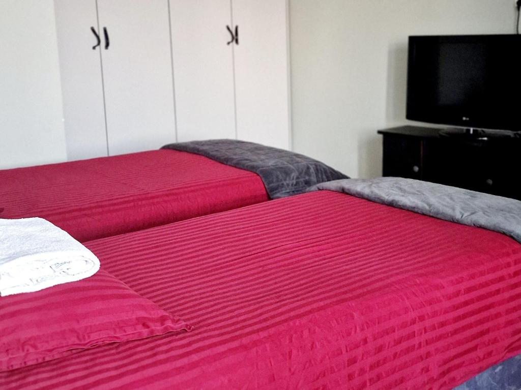 Posteľ alebo postele v izbe v ubytovaní Apartamenty w Kamienicy - centrum, bezpłatny parking