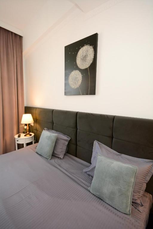Postel nebo postele na pokoji v ubytování Hotel Andre´s