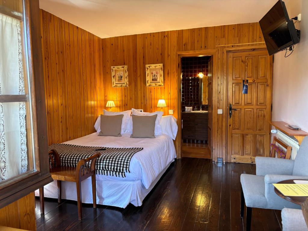 Televízia a/alebo spoločenská miestnosť v ubytovaní El Xalet de Taüll Hotel Rural