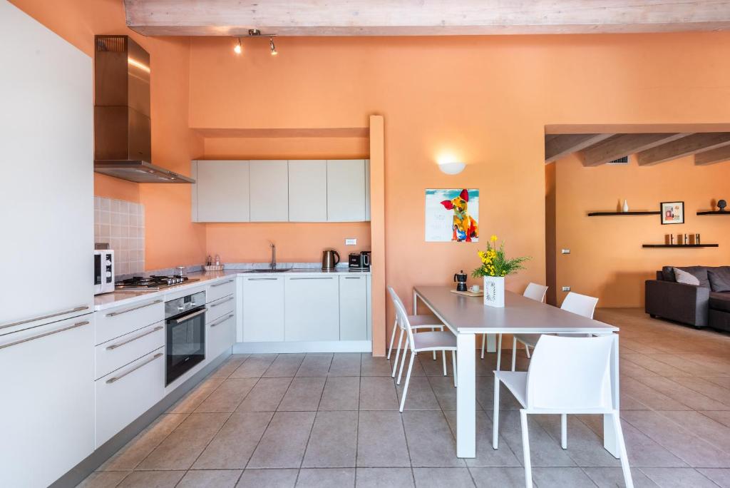 Fotografia z galérie ubytovania Deluxe Apartment Villa Pesca - Cignella Resort v destinácii Osteria Delle Noci