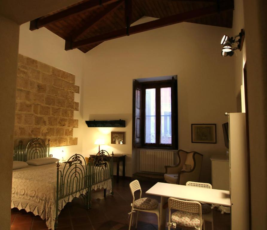 Postel nebo postele na pokoji v ubytování Casa di Orazio