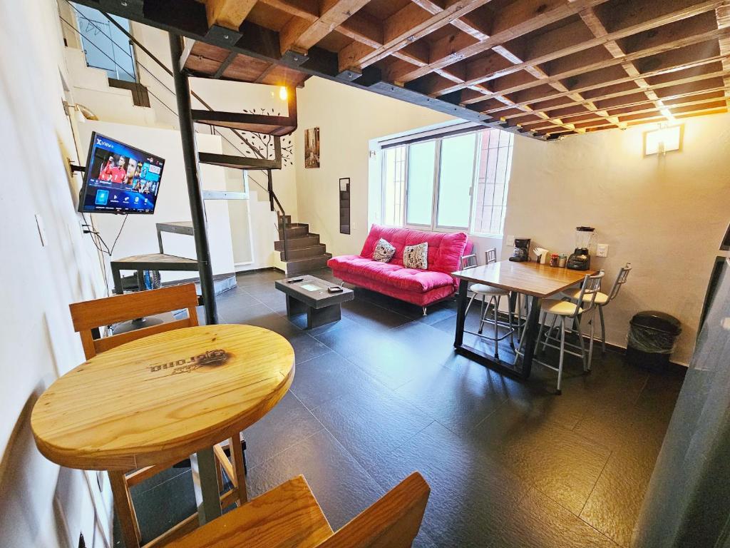 TV a/nebo společenská místnost v ubytování Hotel del Refugio