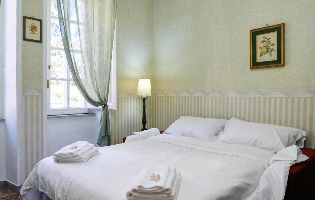 Posteľ alebo postele v izbe v ubytovaní Stunning Apartment In Roma With Wifi