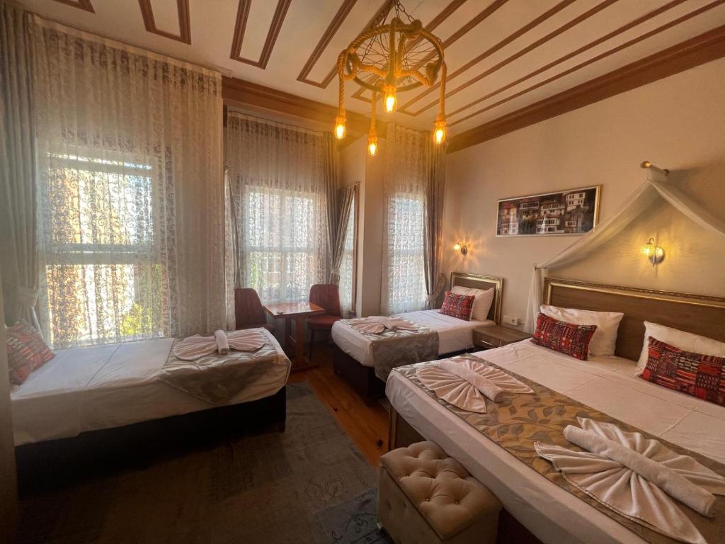 Postel nebo postele na pokoji v ubytování April Story Apart Hotel