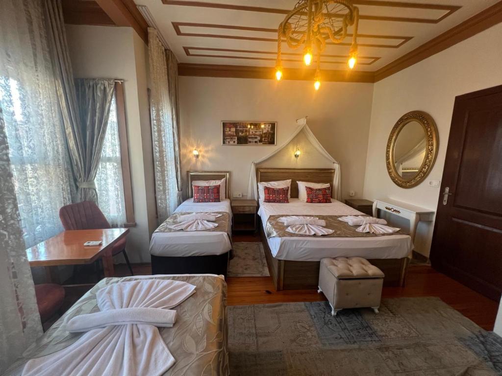 Postel nebo postele na pokoji v ubytování April Story Apart Hotel