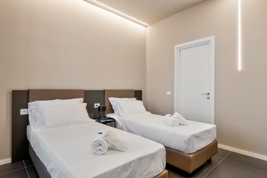 Postel nebo postele na pokoji v ubytování D & D Rooms