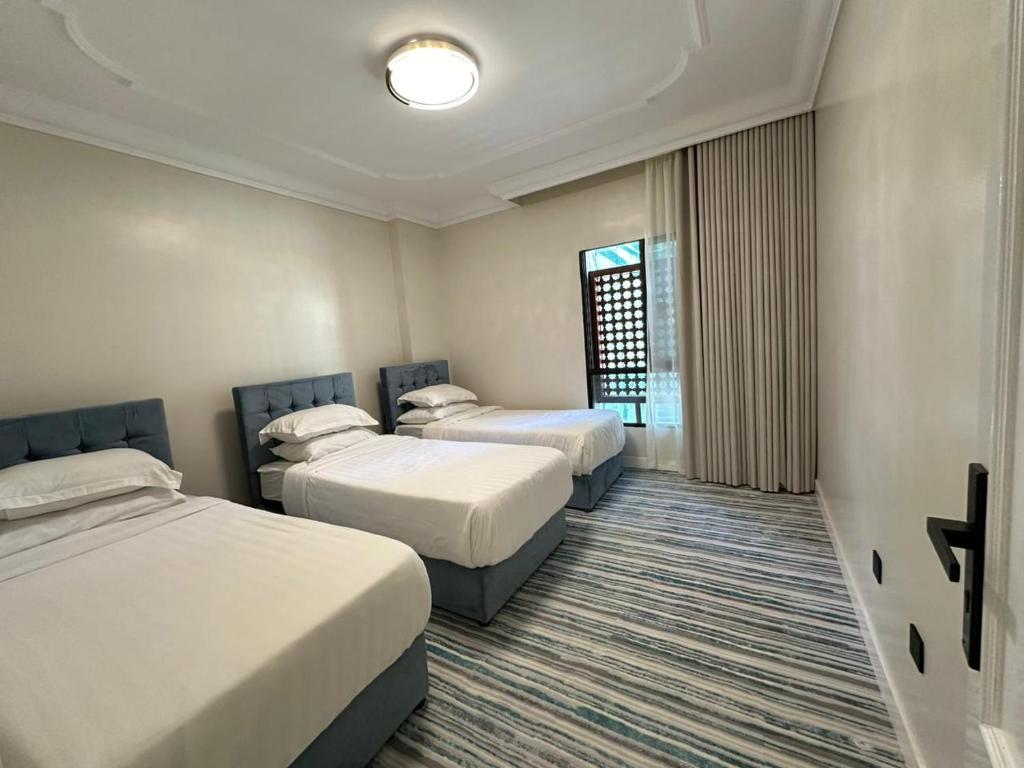 Zad Al Eman Suites Hotels - 带城市景观的套房