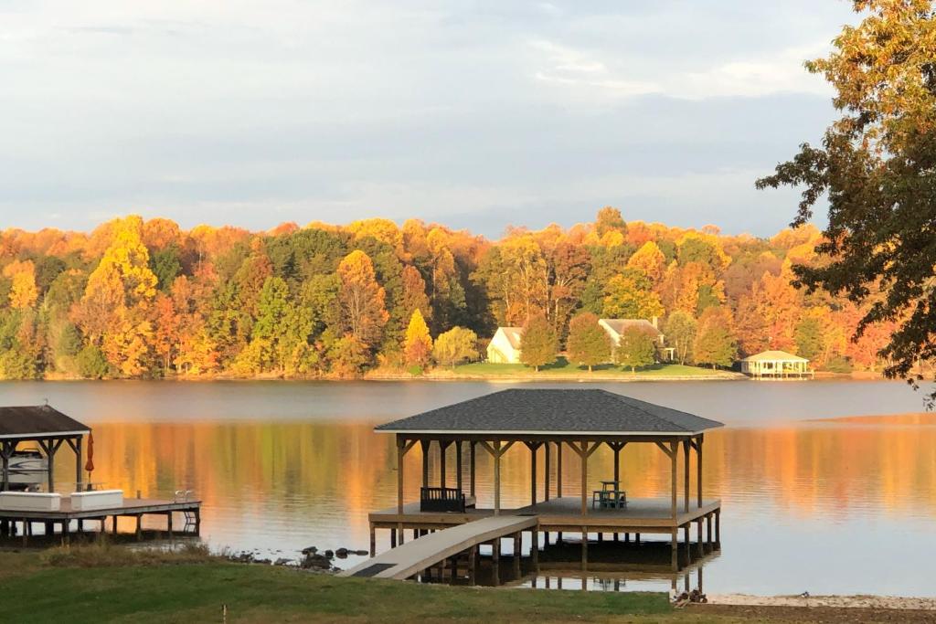 a view of a lake with two pavilion at Waterfront Lake Anna Home Winter Family Escape! in Bumpass