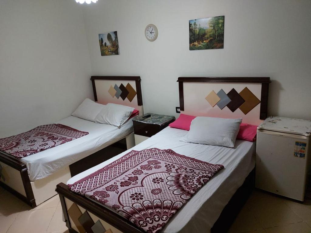 Postel nebo postele na pokoji v ubytování elite residence & aqua park