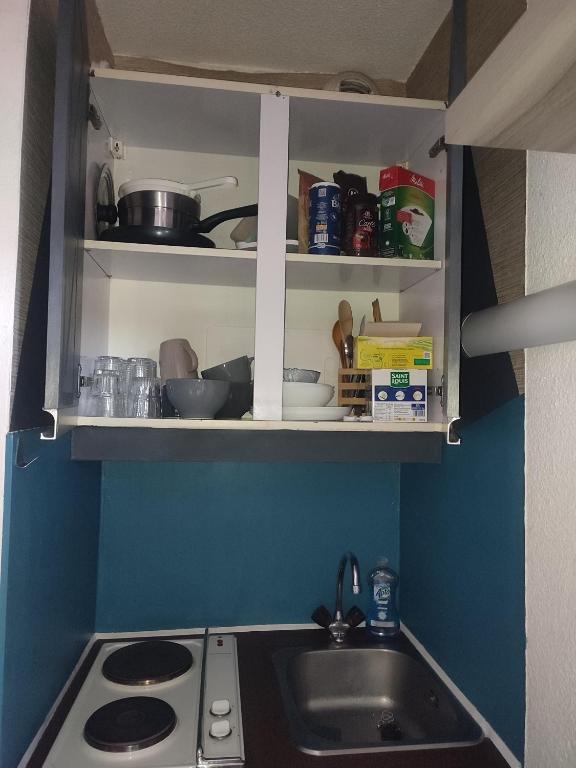 Kuchyň nebo kuchyňský kout v ubytování Le Cow'sy 1800