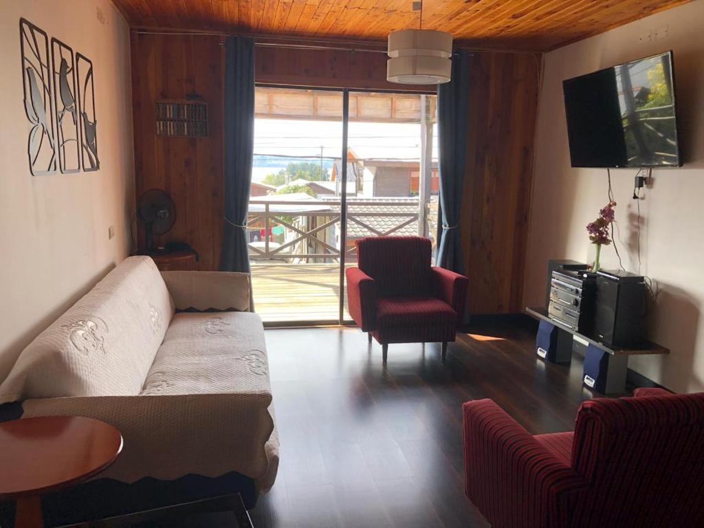 TV a/nebo společenská místnost v ubytování Cabaña a pasos de la costanera con estacionamiento