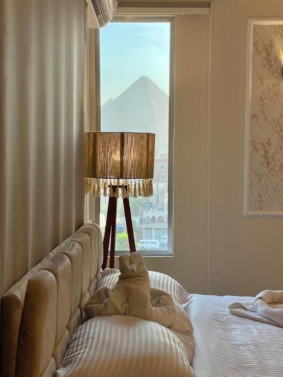 Letto o letti in una camera di Miami Pyramids View