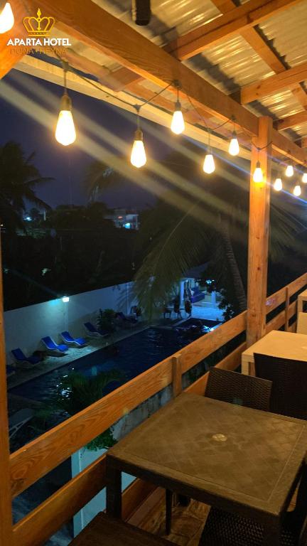 Balkón nebo terasa v ubytování ApartaHotel Dona Reyna Alojamientos en Santo Domingo a 5 min de Aeropuerto Internacional Las Américas