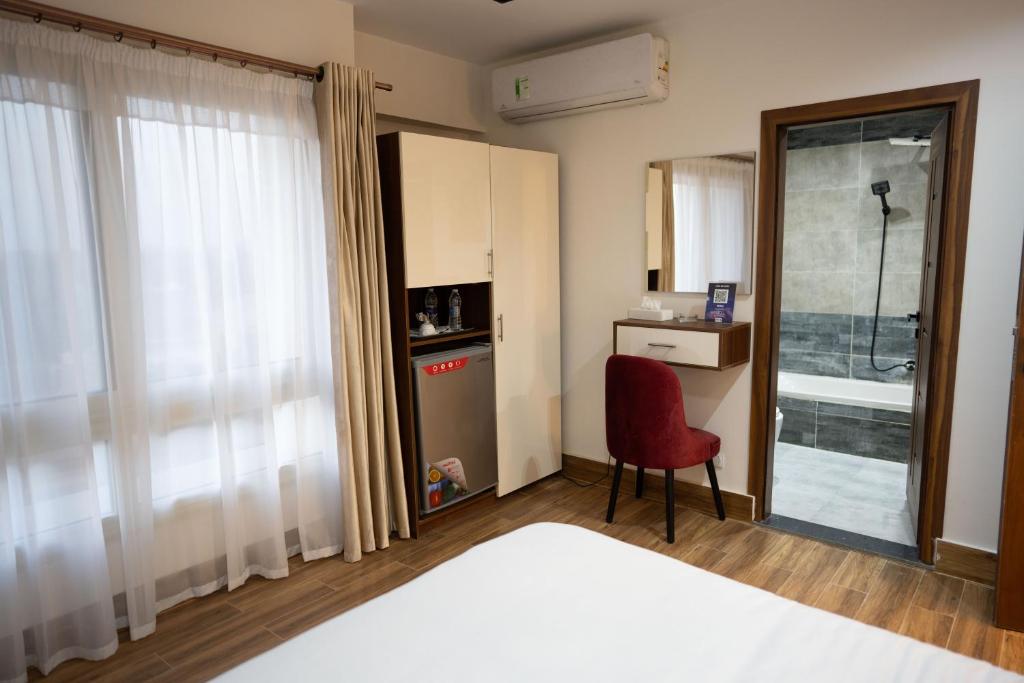 Postel nebo postele na pokoji v ubytování Pyramids Sunshine Hotel