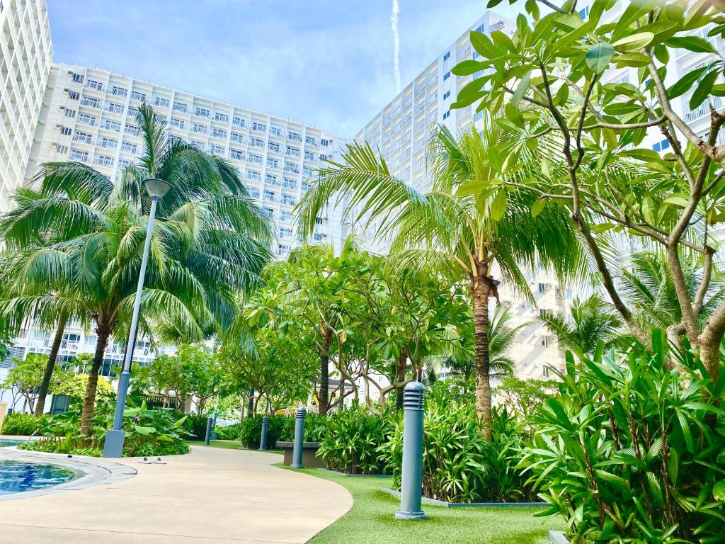 Un jardín fuera de MOA SHORE - Exxy SUITES