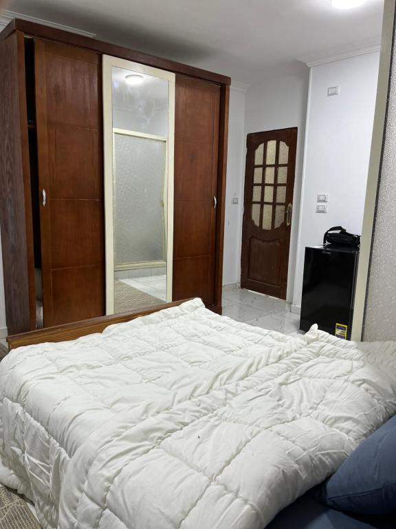 Postel nebo postele na pokoji v ubytování Loay pyramids inn