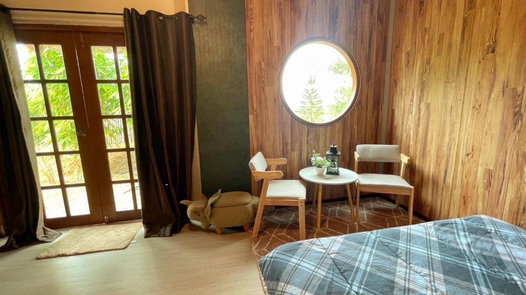 Postel nebo postele na pokoji v ubytování เบาบับ คาเฟ่ & แคมป์ปิ้ง