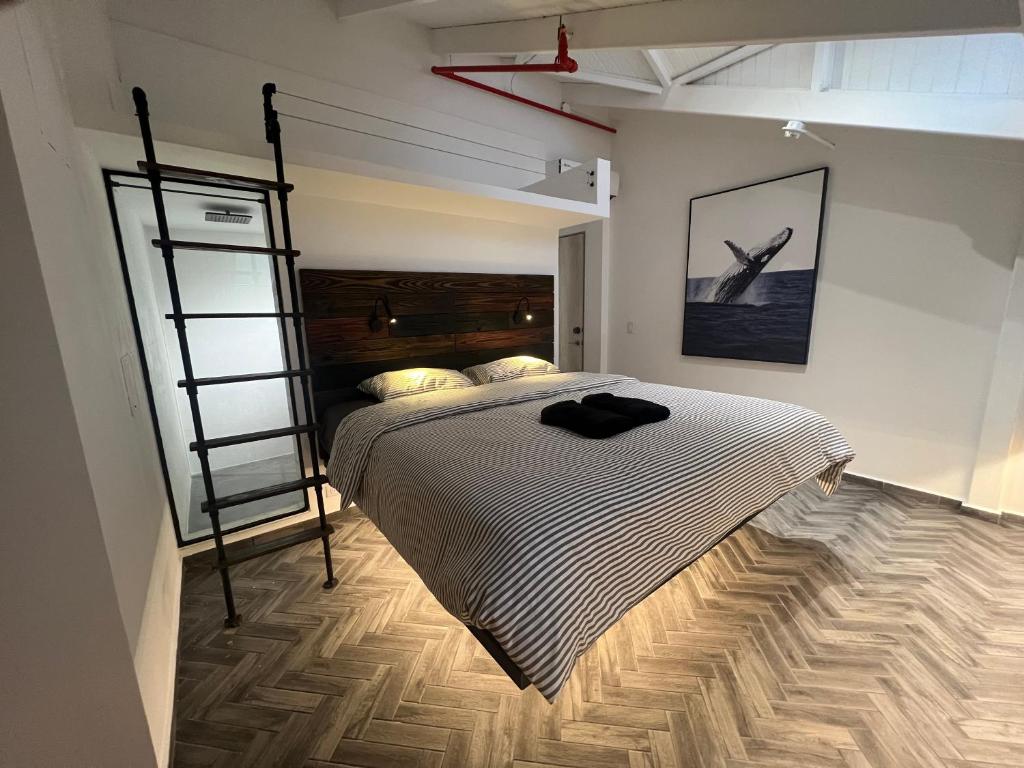 Postel nebo postele na pokoji v ubytování Corcho rooms