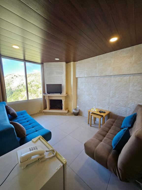 Posezení v ubytování Hotel L'Aiglon