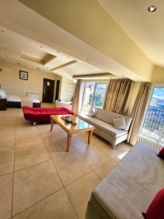 Posezení v ubytování Hotel L'Aiglon