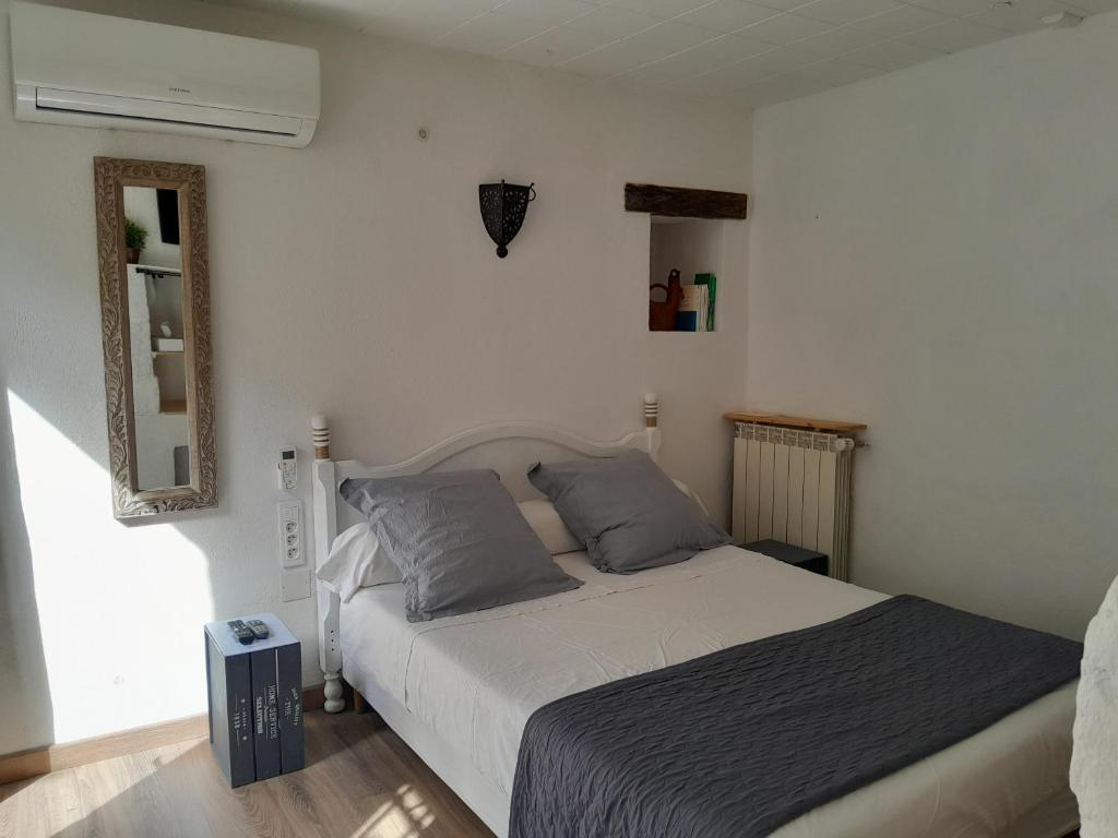 Ένα ή περισσότερα κρεβάτια σε δωμάτιο στο Chambre d'hôte chez Nicole et Pierre