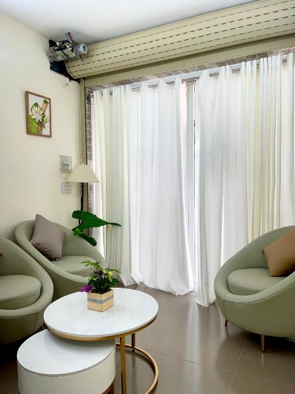 Posezení v ubytování Hoa Ngoc Lan - The Orchid Villa Dalat