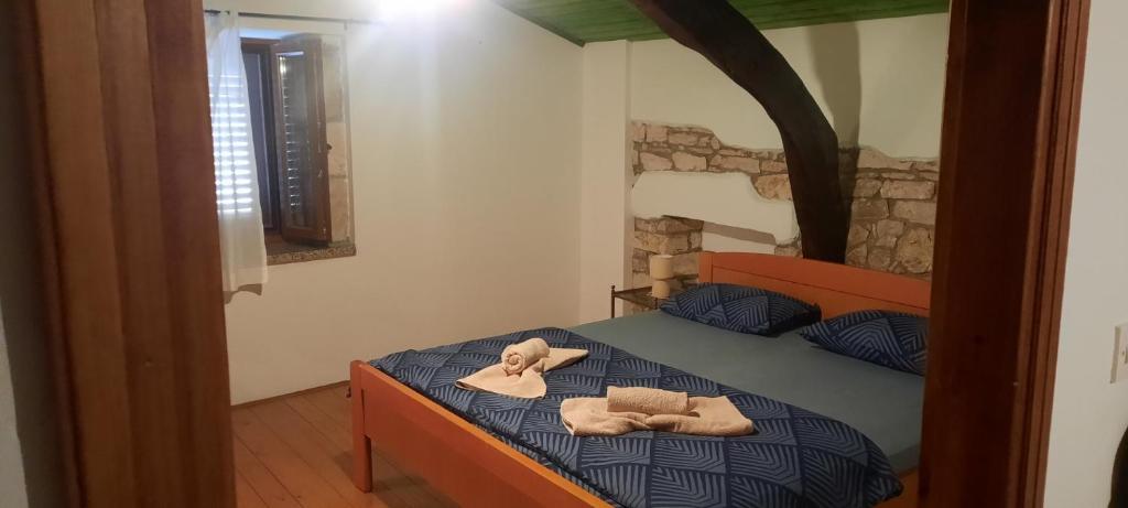 Postel nebo postele na pokoji v ubytování Rural Pension Istra Partner