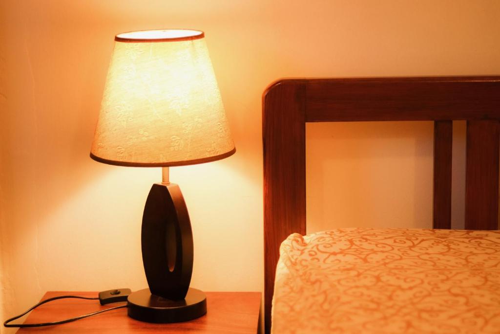 Postel nebo postele na pokoji v ubytování La Maison de Trinco