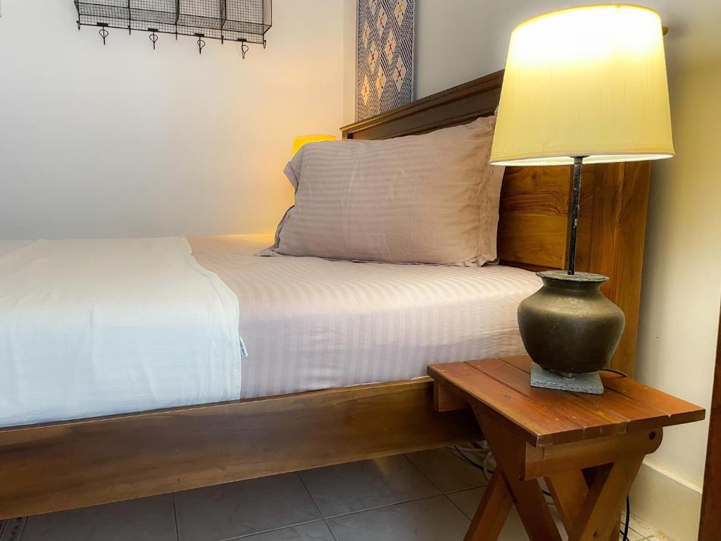 Postel nebo postele na pokoji v ubytování La Maison de Trinco