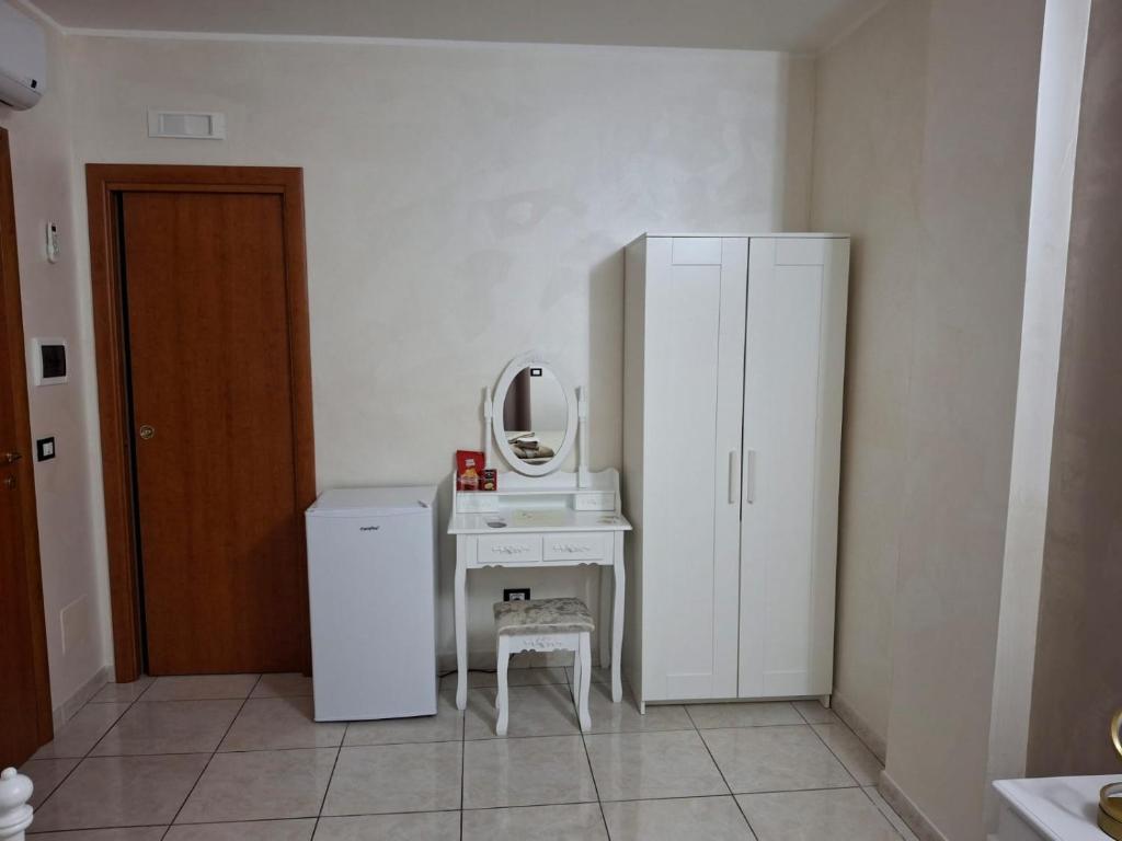 Kuchyň nebo kuchyňský kout v ubytování B&B Da Rocco