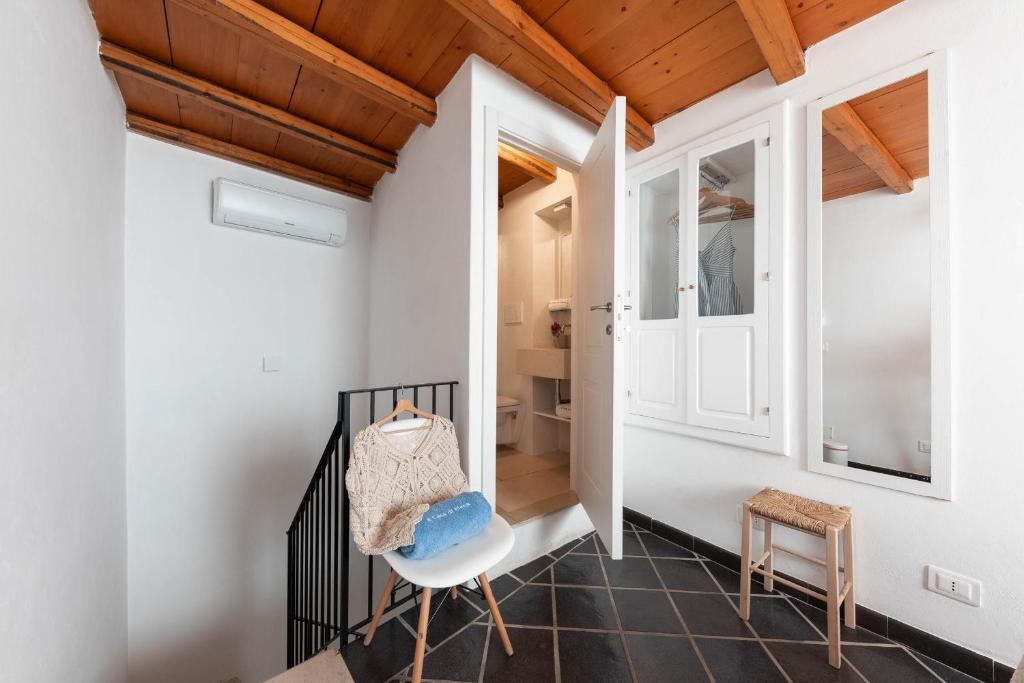 Postel nebo postele na pokoji v ubytování A Casa di Elena