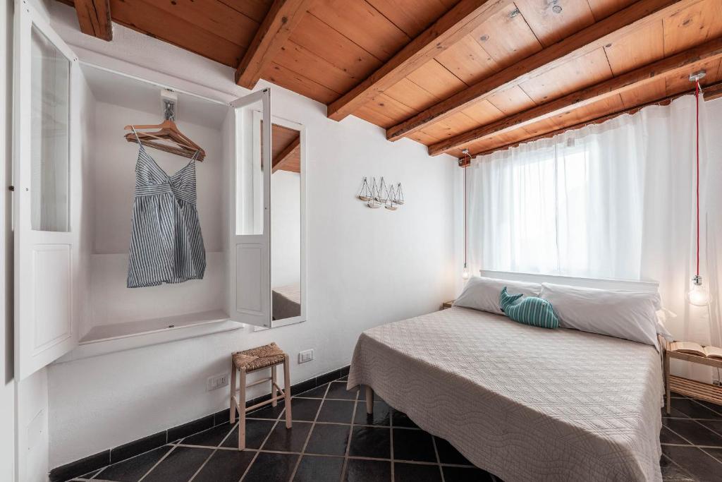 Postel nebo postele na pokoji v ubytování A Casa di Elena