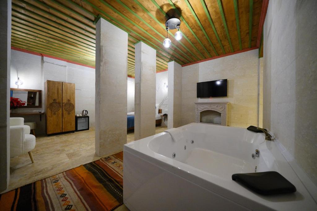 TV a/nebo společenská místnost v ubytování Mayda Cappadocia