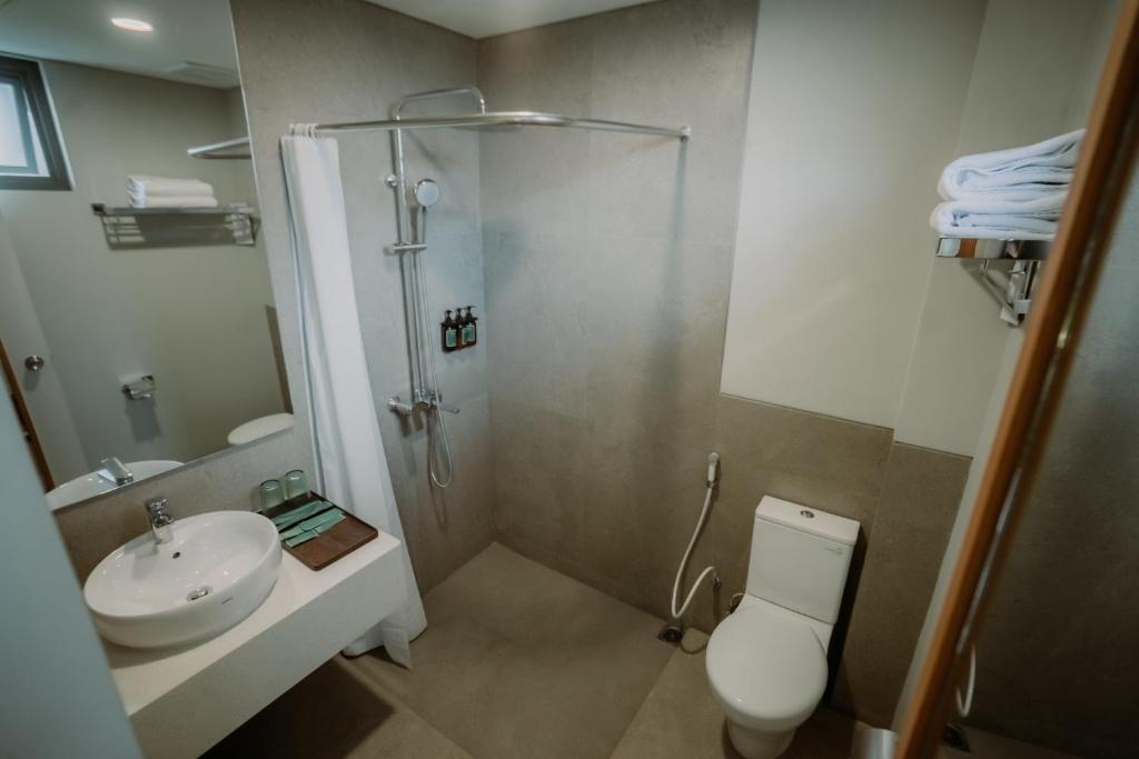 Koupelna v ubytování Jiro Hotel