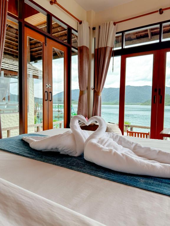 Postel nebo postele na pokoji v ubytování Salakphet Resort